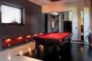 Pool table setup with exact leveling in Asheville